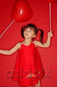 AsiaPix - Girl holding heart shaped balloon