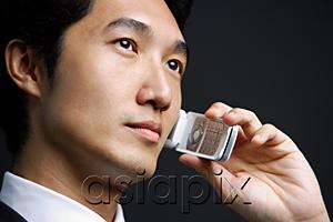 AsiaPix - Businessman using mobile phone