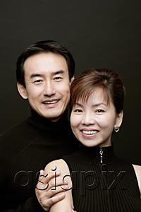 AsiaPix - Couple smiling at camera, portrait
