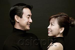 AsiaPix - Couple looking at each other, face to face