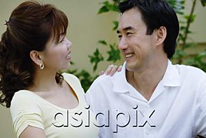 AsiaPix - Mature couple side by side, smiling at each other
