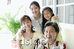 AsiaPix - Three generations of females, looking at camera