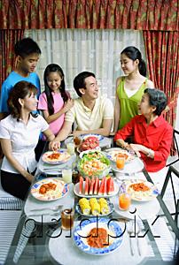 AsiaPix - Three generation family at dining table