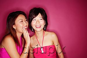 AsiaPix - Woman whispering to friend
