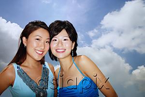 AsiaPix - Two women smiling at camera