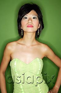 AsiaPix - Woman in green dress, looking at camera