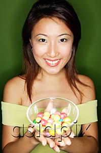 AsiaPix - Woman with a bowl of candy