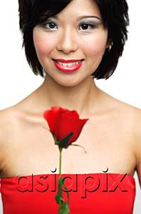 AsiaPix - Woman holding rose, smiling at camera