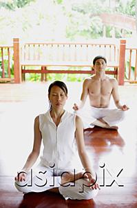 AsiaPix - Two people in yoga position