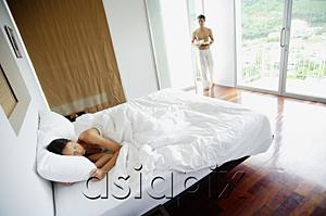 AsiaPix - Woman in bedroom, sleeping, man walking in with tray