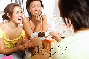 AsiaPix - Young women at home, celebrating birthday