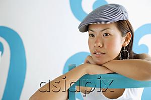 AsiaPix - Young woman wearing beret, looking away