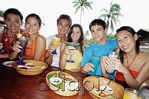AsiaPix - Couples with drinks at beach bar