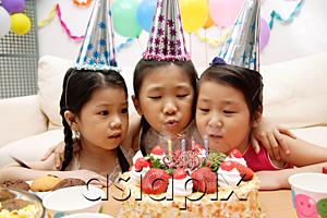 AsiaPix - Three girls celebrating a birthday