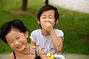 AsiaPix - Young girls in playground, laughing