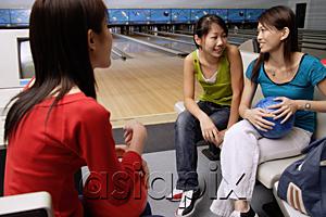 AsiaPix - Women sitting in bowling alley