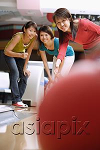 AsiaPix - Three women at a bowling alley