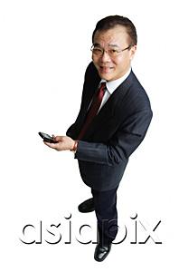 AsiaPix - Businessman holding mobile phone