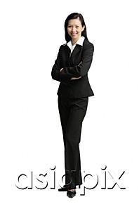 AsiaPix - Businesswoman standing with arms crossed, looking at camera