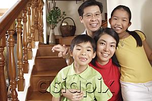 AsiaPix - Family smiling at camera, portrait