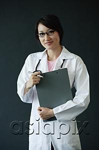 AsiaPix - Female doctor smiling at camera