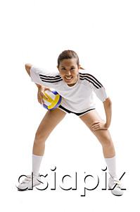 AsiaPix - Young woman bending and holding volleyball