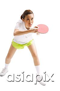 AsiaPix - Young woman with table tennis racket, studio shot