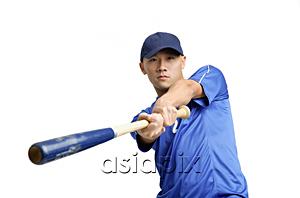 AsiaPix - Young man swinging baseball hat