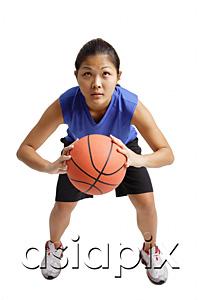 AsiaPix - Young woman holding basketball, aiming for a hot