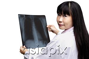 AsiaPix - Doctor holding X-ray, looking over shoulder