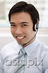 AsiaPix - Businessman with headset on