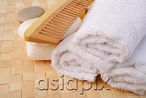 AsiaPix - Still life of bath toiletries, comb, bar of soap and towel