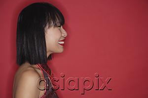 AsiaPix - Woman with bob haircut, smiling, side view