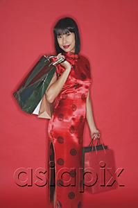 AsiaPix - Woman in red cheongsam, carrying shopping bags