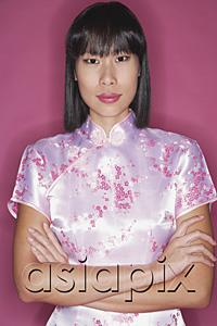 AsiaPix - Woman in pink cheongsam, arms crossed