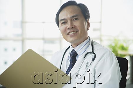 AsiaPix - Doctor smiling at camera