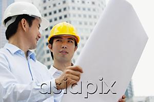 AsiaPix - Two businessmen with blueprints