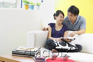 AsiaPix - Couple in living room