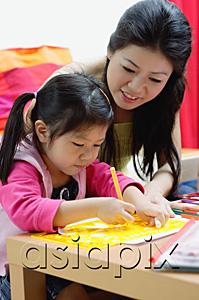 AsiaPix - Mother and young daughter drawing at home