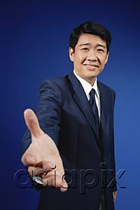 AsiaPix - Businessman with hand outstretched