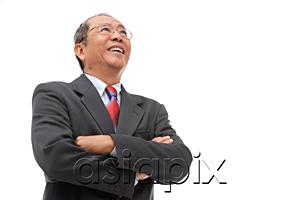 AsiaPix - Businessman looking away, arms crossed