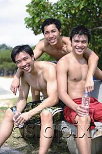 AsiaPix - Three men without shirts, looking at camera