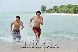AsiaPix - Two men running along the beach