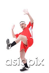 AsiaPix - Man in soccer uniform, standing on one leg, shocked expression