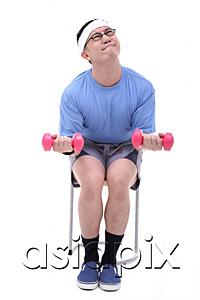 AsiaPix - Man sitting on stool, lifting weights