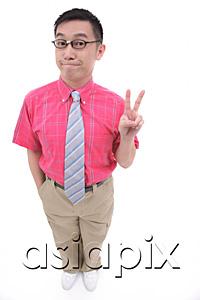 AsiaPix - Man making peace sign, smiling at camera