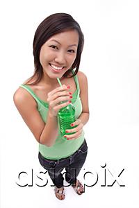 AsiaPix - Young woman drinking from bottle