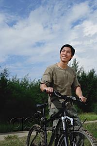 AsiaPix - Man with bicycle, outdoors, smiling