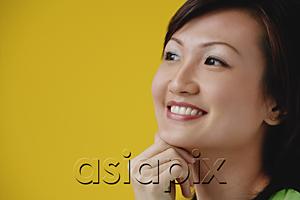 AsiaPix - Young Woman with hand on chin, smiling