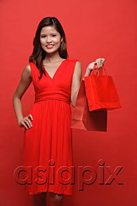 AsiaPix - Woman in red dress carrying shopping bags